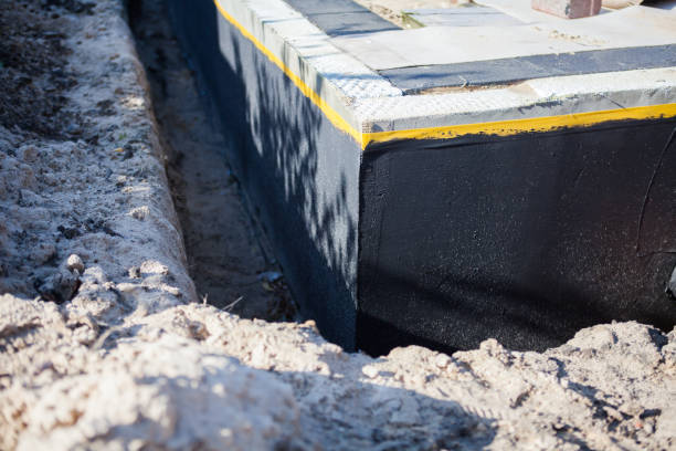 Professional Waterproofing technician working in Springfield, OR